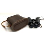 A pair of 8x - 14x50 field binoculars in hard leather case