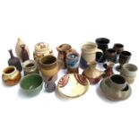 A mixed lot of ceramics, mainly studio pottery, to include stoneware bottles, jugs, vases, lidded