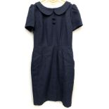 A Matilda & Quinn London navy cotton wool mix dress, size 10, together with a white label (the white