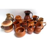 A mixed lot of ceramics to include various glazed jugs and pots