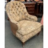 A Victorian button back salon chair, on turned leges and casters, 66cmW