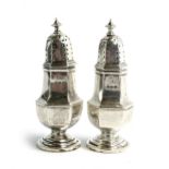 A pair of small late Victorian silver pepperettes by James Deakin & Sons, Birmingham 1895, 10cm