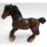 A Beswick brown cantering Shire horse, 21.5cmH