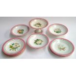 A 19th century hand painted part dinner service, each with pink rim decorated with a central