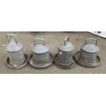 A lot of 4 galvanised poultry feeders