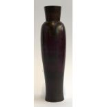 A 20th century Japanese Showa period patinated bronze vase of slender form, stamped to base, 21.5cmH