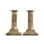 A pair of Neoclassical plated candlesticks, each with removeable bobeche, with beaded border, on a