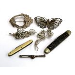 A mixed lot to include white metal Czech filigree butterfly; Czech leaf brooch; Art Nouveau