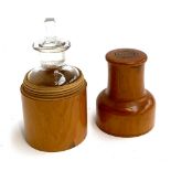 A treen medicine bottle container with glass bottle, the container marked 'Davies & Shepheard