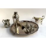 A mixed lot of plated items, to include two white metal cockerels, sauce boat, cocktail shaker,