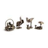 A 925 cast pelican and heron, 4.5 and 3.8cmH; together with a white metal toadstool; and basket of