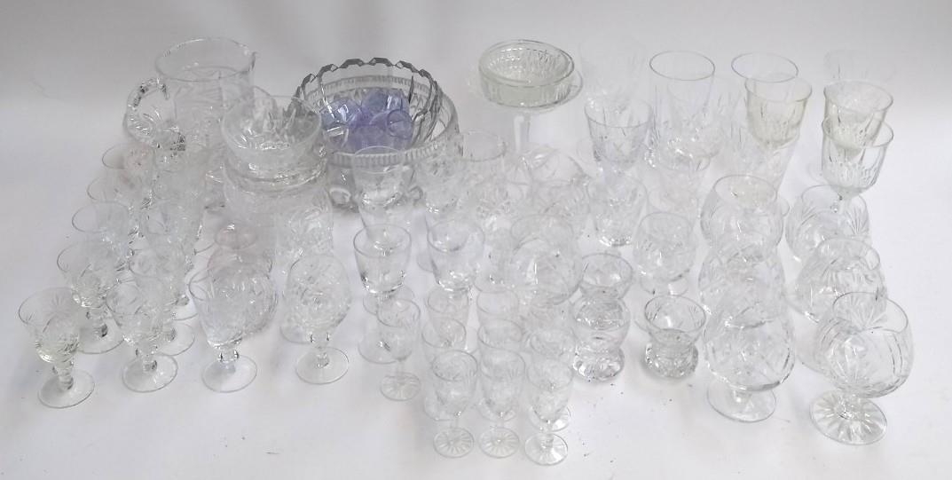 A large collection of cut glass and crystal to include a set of 6 glasses with engraved floral