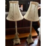 A pair of painted resin table lamps