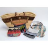 A Harvey Nichols wicker basket; a Harrods shopping bag; Koko Riko bag and two Kilim purses