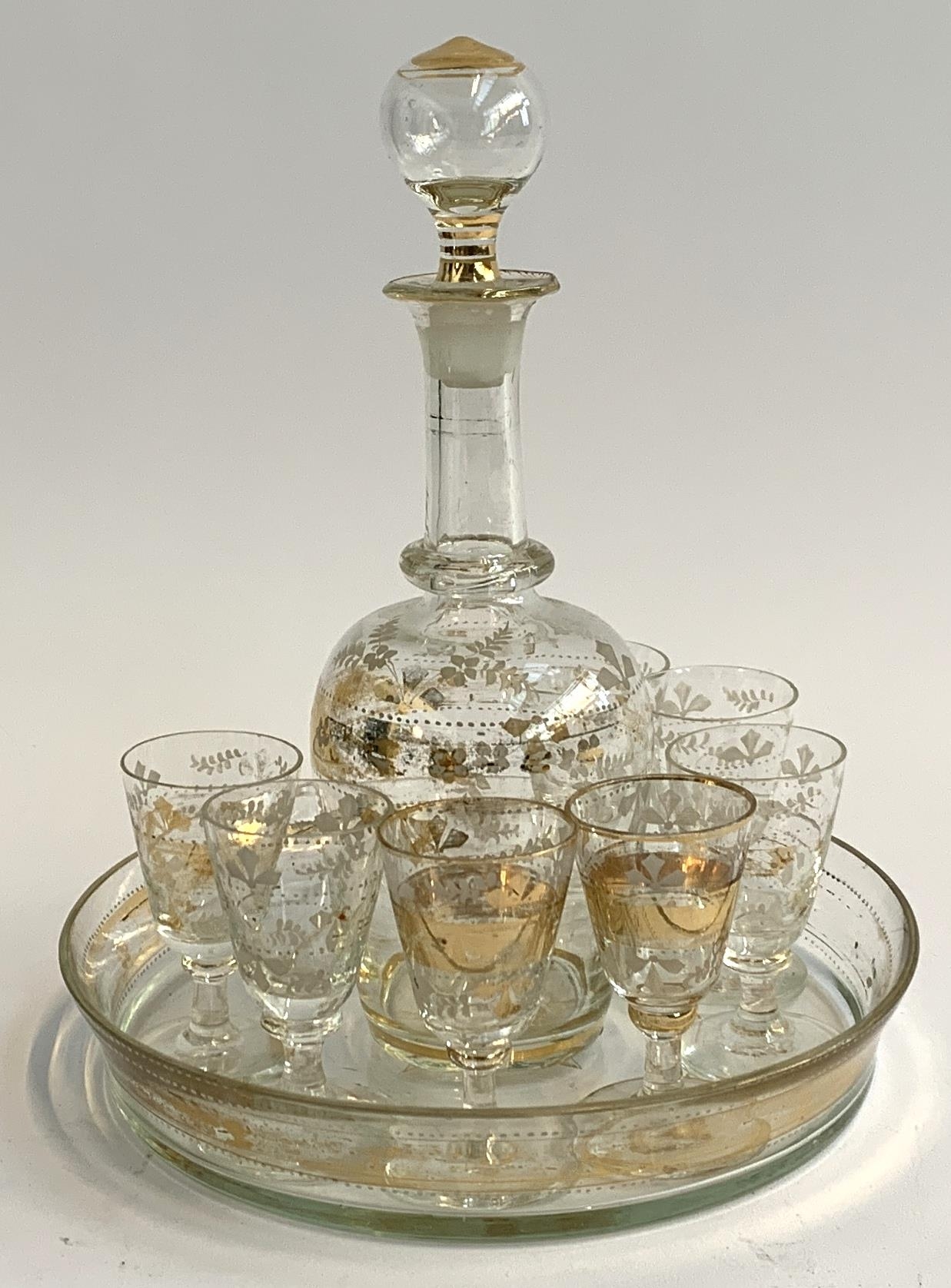 A Bohemian glass gilt schnapps decanter set, comprising decanter, seven stemmed glasses, and - Bild 2 aus 2