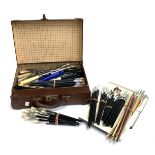 A gent's overnight case containing a large quantity of artist's brushes including Winsor & Newton,