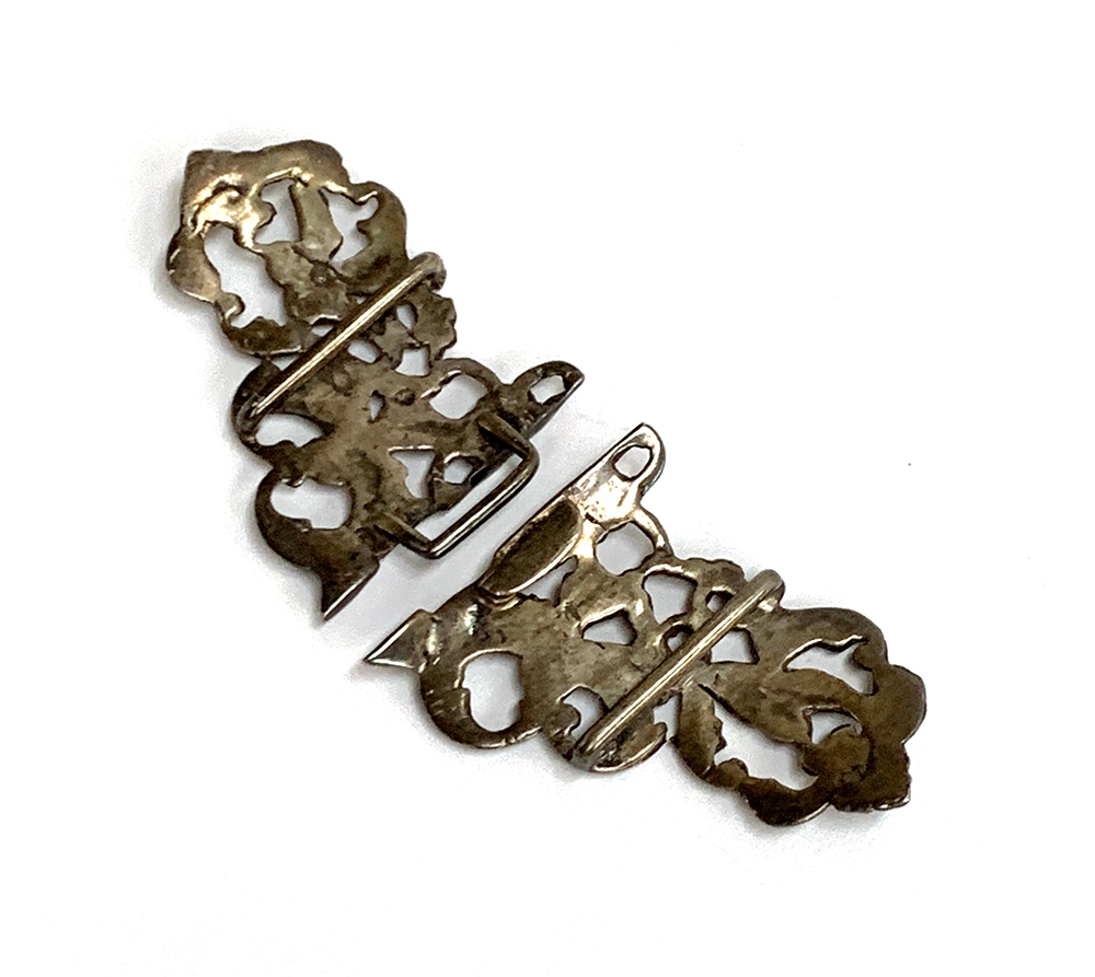 An early 20th century silver nurses buckle with pierced dove design, hallmarked Samuel Jacob, - Image 2 of 2