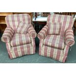 A pair of 20th century armchairs in herringbone tartan check, outward scrolling arms, on casters,