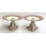 A pair of 19th century pierced tazzas, with pink and gilt decoration, each 23cmD and 14.5cmH,
