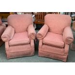 A pair of 20th century armchairs, outward scrolling arms, on casters, approx. 81cmW, with loose