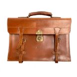 A brown leather satchel by Titan, 42cmW