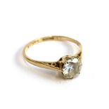 A 9ct gold ring set with a cubic zirconia, size Q, 1.7g