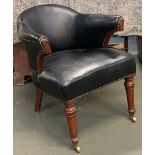 A dark green vinyl upholstered mahogany captains chair on brass casters, 62cmW
