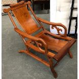 A Chinese carved likely Huanghuali wood easy chair, 57cmW