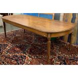 A large dining table, on tapering reeded legs, 260x110x77cmH