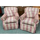 A pair of 20th century armchairs in herringbone tartan check, outward scrolling arms, on casters,