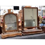 A Victorian adjustable dressing mirror with brass candle sconces either side, 69cmH; together with