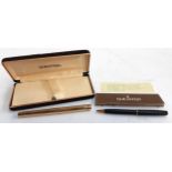 A gold plated Sheaffer fountain pen with 14ct nib and IBM logo to top, inscribed D.R. Coulson, in