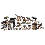 A collection of die cast metal animals and figures to include Britains, cows, horses, camel,