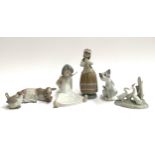 Five Lladro figurines to include seated angel, girl with apron, 21.5cmH, cat, cow and songbird,