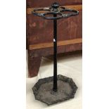 A cast iron stick stand, with octagonal drip tray, 62cmH