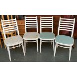 A set of four white painted ladder back kitchen chairs