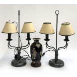 A pair of wrought metal two arm table lamps, together with a Chinese vase converted, 27cmH, (af)