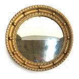 A 20th century Regency style circular giltwood convex mirror with bobble moulding, 39.5cmD