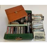 A quantity of postcards; together with a collection of CDs and cassettes etc