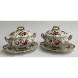 A pair of 19th century hand painted lidded tureens with stands, marked 1991 to base