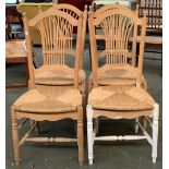 A set of four modern beech kitchen chairs, with rush seats