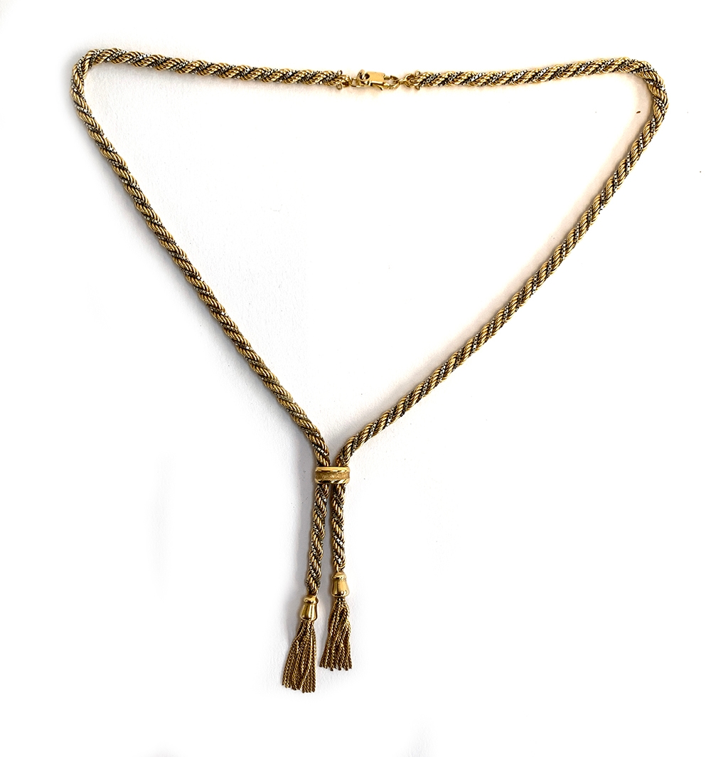 A 9ct gold and white metal tassel necklace, the clasp marked 375, 23.4g
