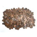 A large quantity of British one penny coins from the 1860s to 1960s, together with a handful of