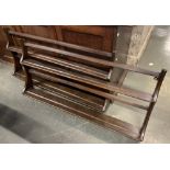 A pair of Ercol stained oak plate racks, each with label, 97cmW