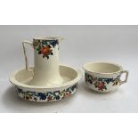 A Falconware washbowl, jug, and chamberpot, the washbowl 39cmD