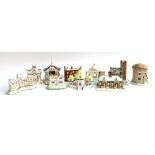 A lot of ten various Coalport ceramic cottages to include The Alms Houses, Village Church, The