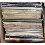 A mixed box on vinyl LPs to include The Beatles, The Bee Gees, Status Quo etc
