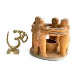 A Circle of Friends figure group, Mayan, pre-Columbian style 19cmH and a brass figure of the