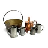 A vintage copper watering can (af), a brass saucepan, William IV pewter measure and three pewter