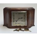 An Art Deco style mahogany cased mantel clock, 34cmW